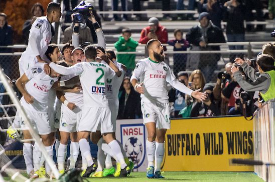The Cosmos celebrate a goal on their way to picking up another championship.